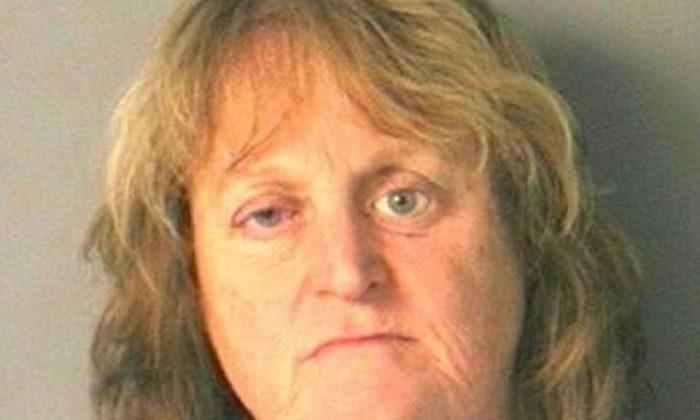 Woman Arrested After She Pushed Her Dog in a Lake, Watched It Drown