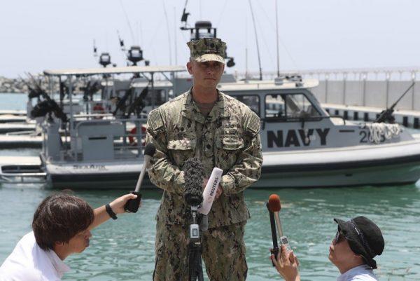 Cmdr. Sean Kido of the U.S. Navy's 5th Fleet speaks to journalists at a 5th Fleet Base, during a trip organized by the Navy for journalists, near Fujairah, United Arab Emirates on June 19, 2019. (Kamran Jebreili/Photo via AP)