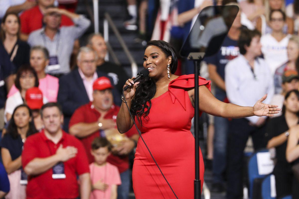 Mary Millben sings the national anthem at President Donald Trump’s 2020 re-election event in Orlando, Fla., on June 18, 2019. (Charlotte Cuthbertson/The Epoch Times)