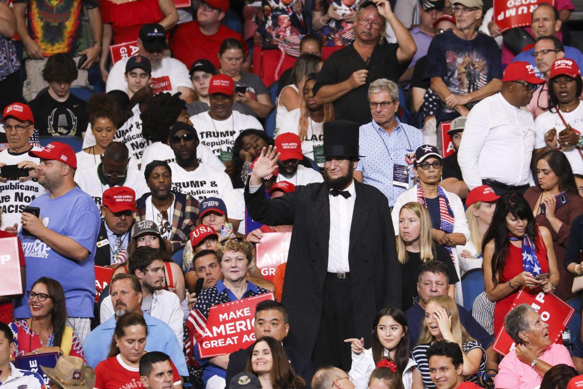 An audience member depicting former president Abe Lincoln attends President Donald Trump’s 2020 re-election event in Orlando, Fla., on June 18, 2019. (Charlotte Cuthbertson/The Epoch Times)
