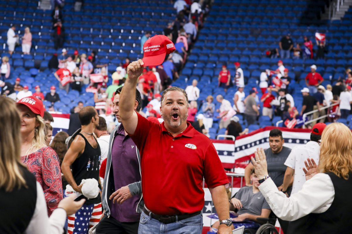 Audience members at President Donald Trump’s 2020 re-election event in Orlando, Fla., on June 18, 2019. (Charlotte Cuthbertson/The Epoch Times)