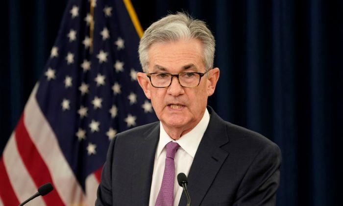 Fed Leaves Interest Rate Unchanged, but Signals Future Cuts