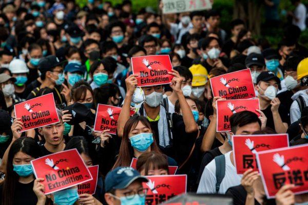 Protesters occupy a street demanding Hong Kong leader to step down after a rally against the now-suspended extradition bill outside of the Chief Executive Office in Hong Kong on June 17, 2019. (Anthony Kwan/Getty Images)