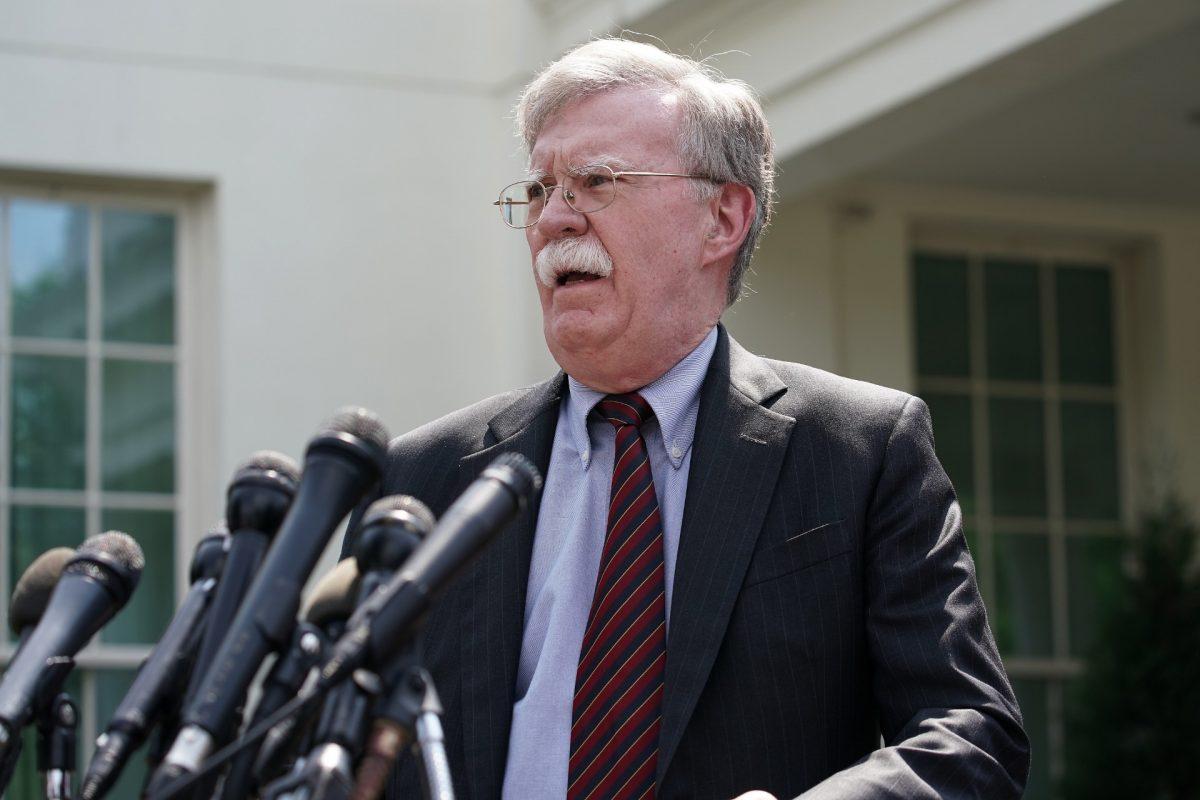 White House National Security Advisor John Bolton talks to reporters outside of the White House in Washington on April 30, 2019. (Chip Somodevilla/Getty Images)