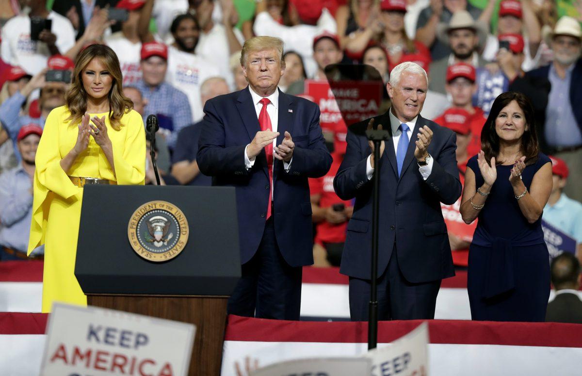 First Lady Melania Trump, President Donald Trump, Vice President Mike Pence, and Karen Pence greet supporters at a rally where Trump formally announced his 2020 reelection bid in Orlando, Fla., on June 18, 2019. (John Raoux/AP Photo)