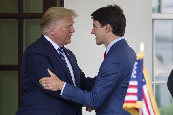 President Donald Trump greets Canadian Prime Minister Justin Trudeau upon his arrival at the White House on June 20, 2019. (AP Photo/Alex Brandon)