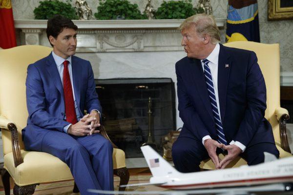 Canadian Prime Minister Justin Trudeau meets with U.S. President Donald Trump in the Oval Office of the White House on June 20, 2019. (AP Photo/Evan Vucci)