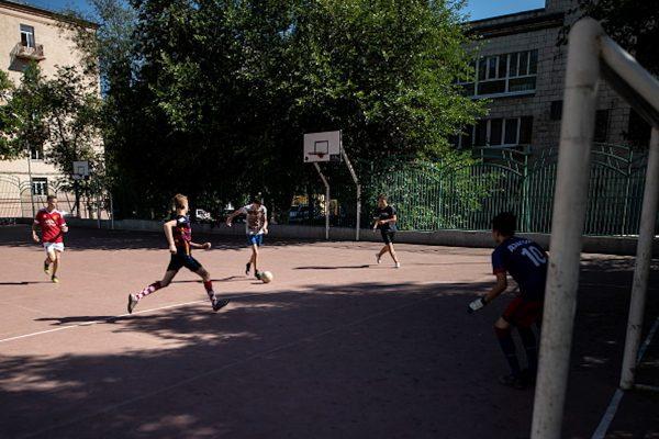 VOLGOGRAD, RUSSIA JUNE 23, 2018: Boys playing football in the playground. Sergei Bobylev/TASS (Photo by Sergei BobylevTASS via Getty Images)