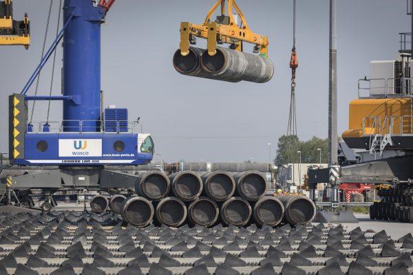 A crane moves Nord Stream 2 pipes at Mukran Port near Sassnitz, Germany, on June 5, 2019. (Axel Schmidt/Getty Images)