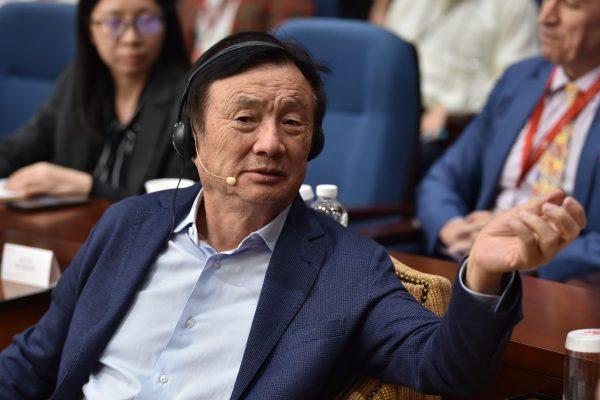 Huawei founder and CEO Ren Zhengfei (C) gestures as he attends a panel discussion on technology, markets and enterprise in Shenzhen on June 17, 2019. (HECTOR RETAMAL/AFP/Getty Images)