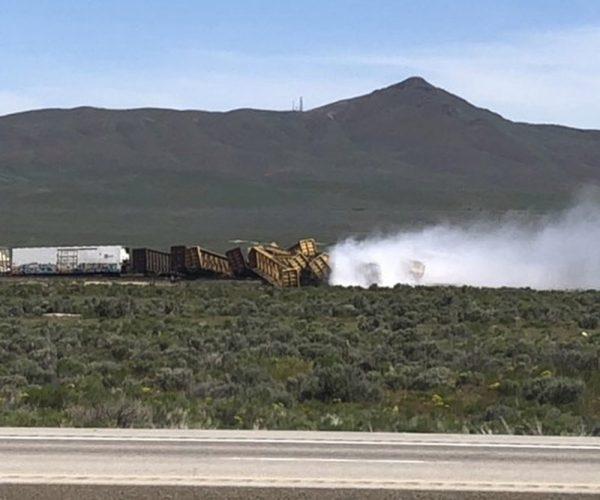 In this photo provided by Michael Lyday shows a train derailment and potential hazardous materials spill east of Wells, Nev., on June 19, 2019. (Michael Lyday via AP)