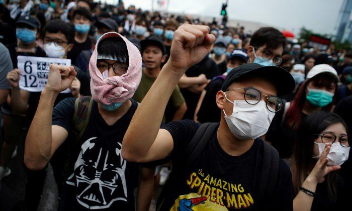 Activists in Hong Kong Make Pitch to Extradition Protesters: Register to Vote