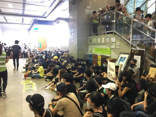 Protesters sit inside the Immigration Tower to protest against the extradition bill in Hong Kong on June 21, 2019. (Anti-Extradition Bill Information Channel)