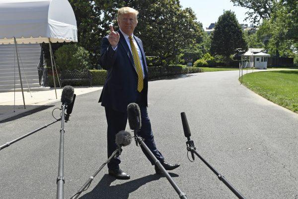 President Donald Trump speaks to reporters on the South Lawn of the White House in Washington, Saturday, June 22, 2019, before boarding Marine One for the trip to Camp David in Maryland. (Susan Walsh/AP)