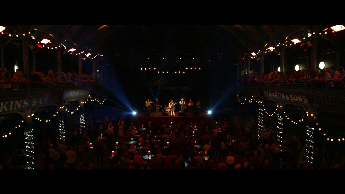 Rose-Lynn Harlan (Jessie Buckley) sings and plays at Glasgow's version of Nashville's Grand Ole Opry, in “Wild Rose.” (Neon)
