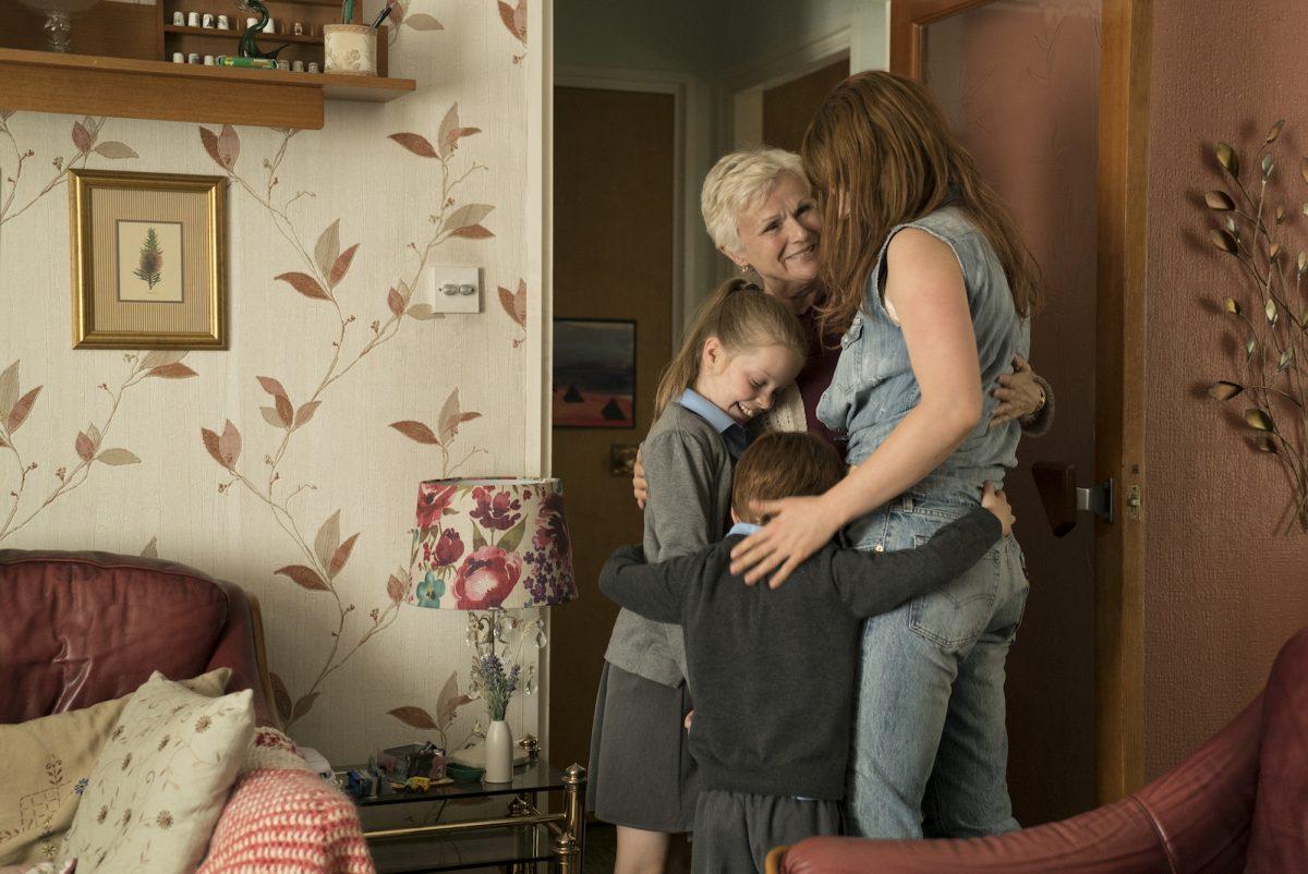 Rose-Lynn Harlan (Jessie Buckley) and her family in “Wild Rose.” (Neon)