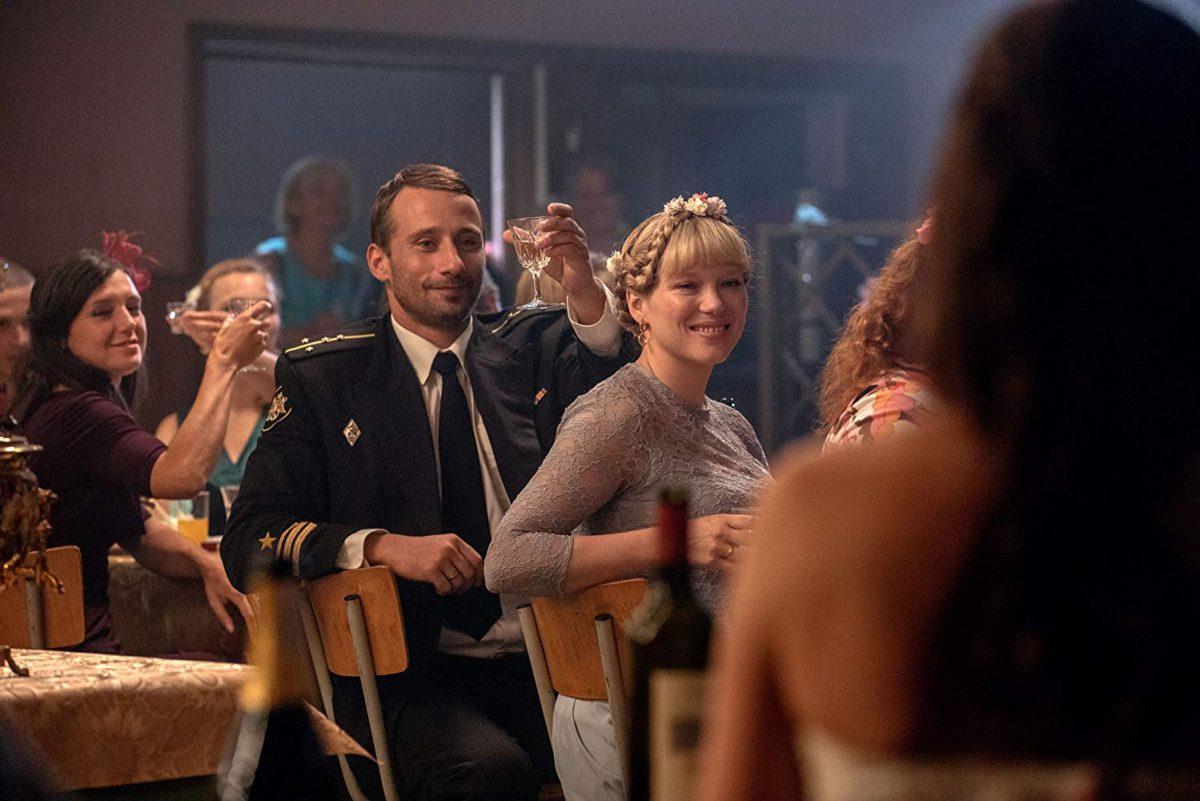 Matthias Schoenaerts as Captain Mikhail Averin and Léa Seydoux as his wife, enjoying the wedding of the captain’s best friend, in “The Command.” (Belga Productions)