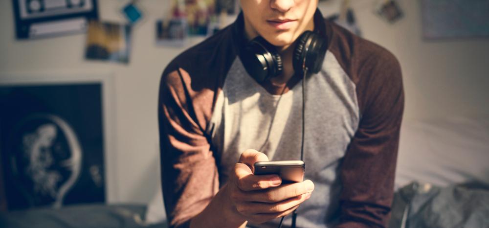 The boys were tested to see if they would persevere in trying to meet the fictitious "Amanda" (Illustration - Shutterstock | <a href="https://www.shutterstock.com/image-photo/teenage-boy-bedroom-listening-music-through-1170692434?src=ZJBNhx2r-5d7r-F_kAjVgA-1-8&studio=1">Rawpixel.com</a>)