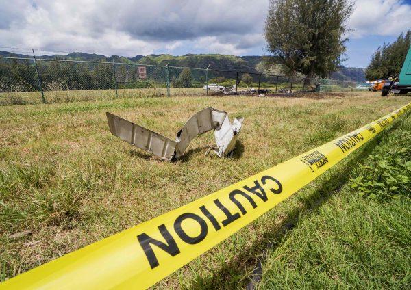 This is the site where the King Air twin-engine plane crashed at the fence line at Dillingham Airfield in Mokuleia, Oahu, where eleven people died on June 21, 2019. (Dennis Oda/Honolulu Star-Advertiser via AP)
