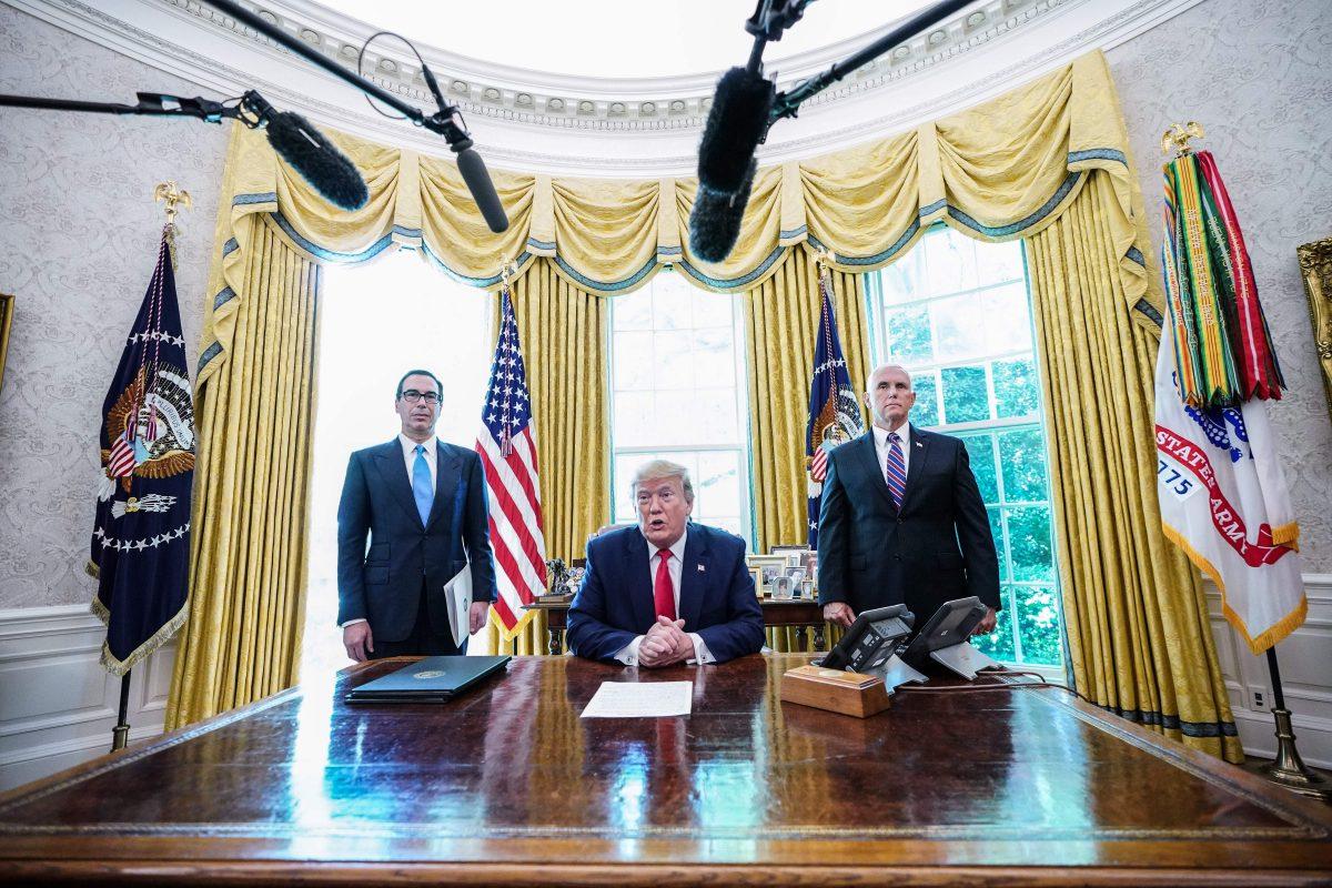 President Donald Trump meets with Vice President Mike Pence (R) and Secretary of Treasury Steven Mnuchin at the White House on June 24, 2019, before signing 'hard-hitting sanctions' on Iran's supreme leader. (MANDEL NGAN/AFP/Getty Images)