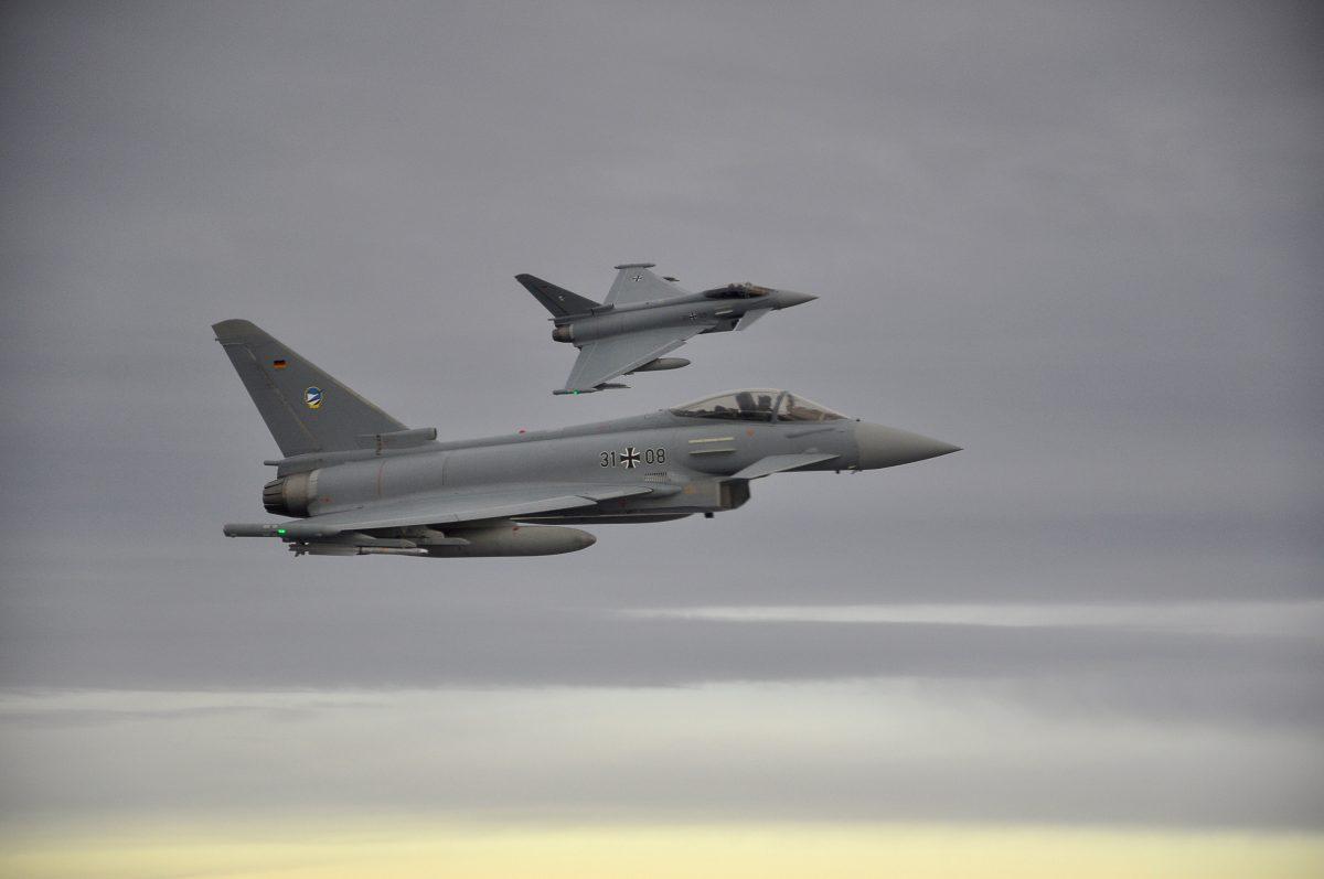 Two German Eurofighter jets simulate the interception of a plane over the Baltic sea on Nov. 1, 2018. (Sabine Siebold/Reuters)