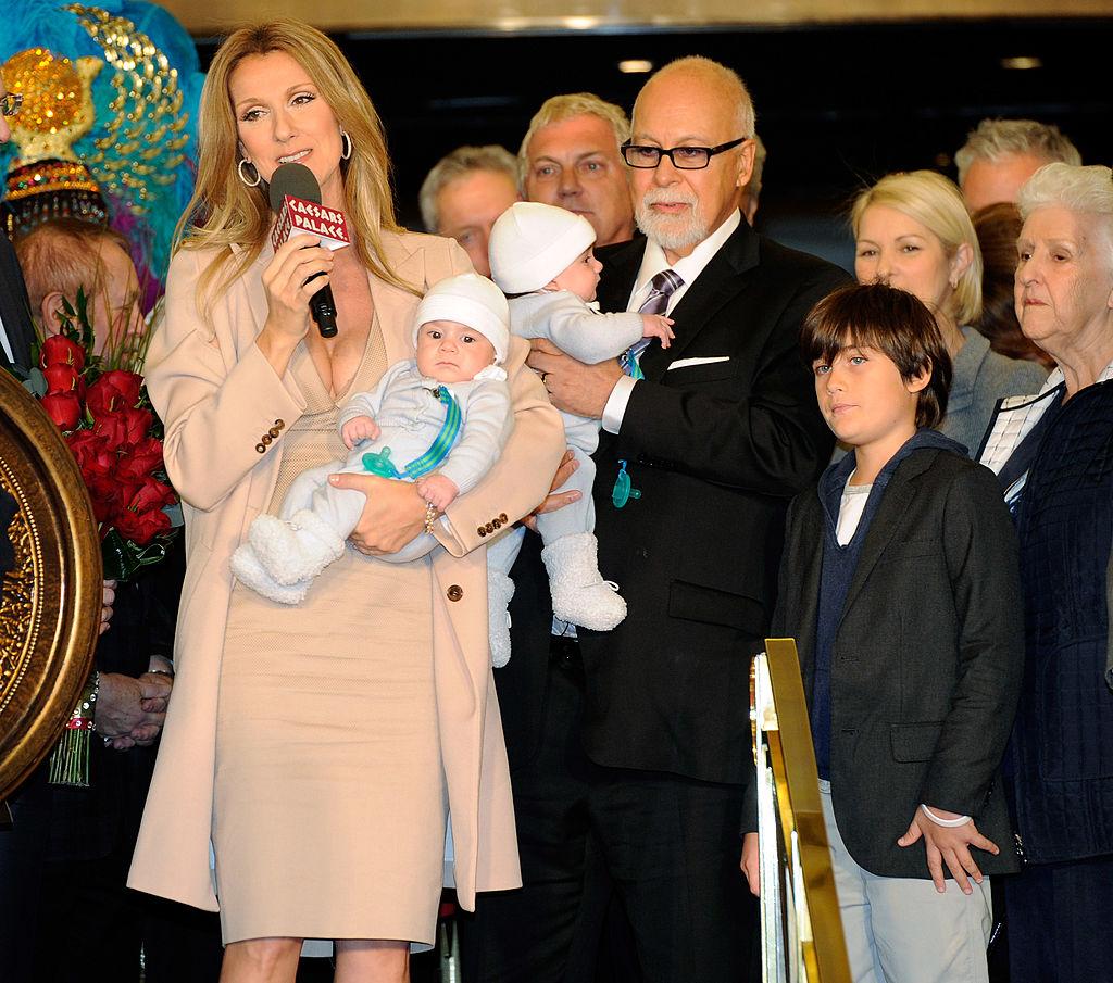 Not only were Dion and Angélil a successful duo in the music business, they were a happy couple and parents (©Getty Images | <a href="https://www.gettyimages.com/detail/news-photo/singer-celine-dion-holding-her-son-nelson-angelil-her-news-photo/109246995?adppopup=true">Ethan Miller</a>)