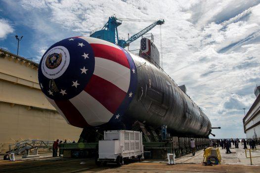 The Virginia-class attack submarine Pre-commissioning Unit (PCU) John Warner (SSN 785) is moved to Newport News Shipbuilding's floating dry dock in preparation for the Sept. 6, 2014, christening in Newport News, Virginia, on Aug. 31, 2014. U.S. Navy/John Whalen/Huntington Ingalls Industries/Handout via REUTERS