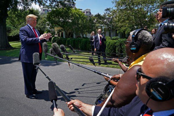 U.S. President Donald Trump talks with reporters before leaving the White House for the G20 summit in Washington, on June 26, 2019. (Chip Somodevilla/Getty Images)