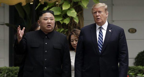 President Donald Trump and North Korean leader Kim Jong Un take a walk after their first meeting at the Sofitel Legend Metropole Hanoi hotel, in Hanoi, Vietnam, on June 23, 2019. (Evan Vucci/AP Photo)