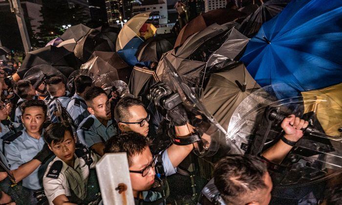Overnight Scuffles as Hong Kong Protesters Continue “Fight” for Democracy