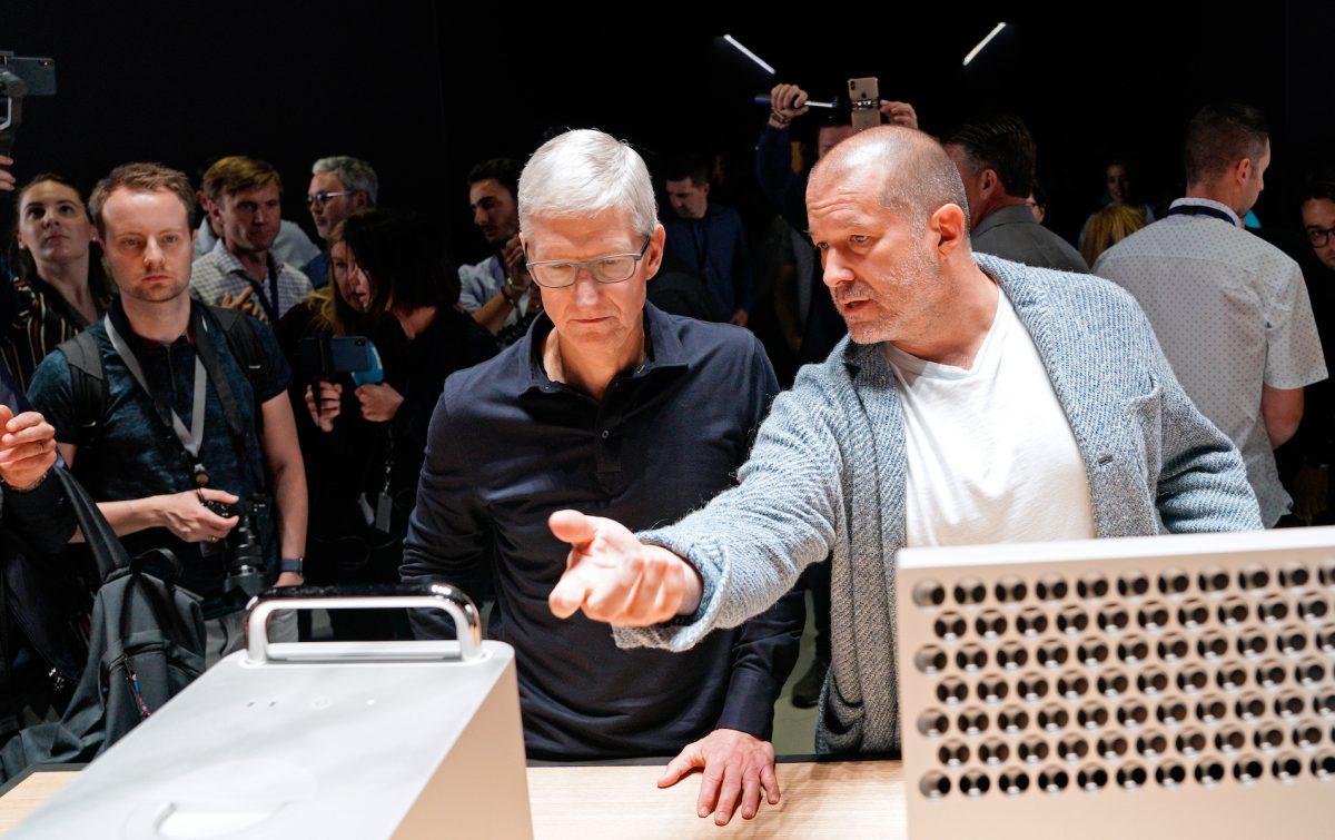 Apple CEO Tim Cook and Chief Design Officer Jonathan Ive (R) look over the new Mac Pro during Apple's annual Worldwide Developers Conference in San Jose, Calif., on June 3, 2019. (Reuters/Mason Trinca)