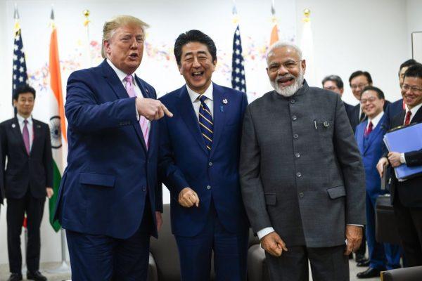 (L-R) US President Donald Trump, Japanese Prime Minister Shinzo Abe and India's Prime Minister Narendra Modi attend a meeting during the G20 Osaka Summit in Osaka on June 28, 2019. (BRENDAN SMIALOWSKI/AFP/Getty Images)