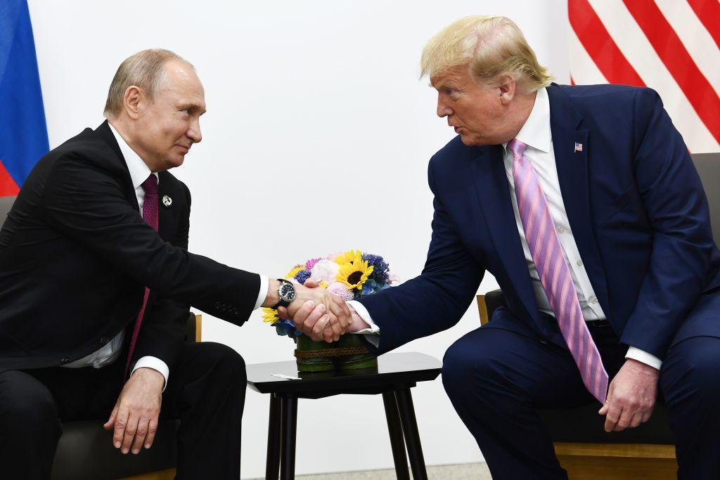 U.S. President Donald Trump (R) attends a meeting with Russia's President Vladimir Putin during the G-20 summit in Osaka on June 28, 2019. (BRENDAN SMIALOWSKI/AFP/Getty Images)