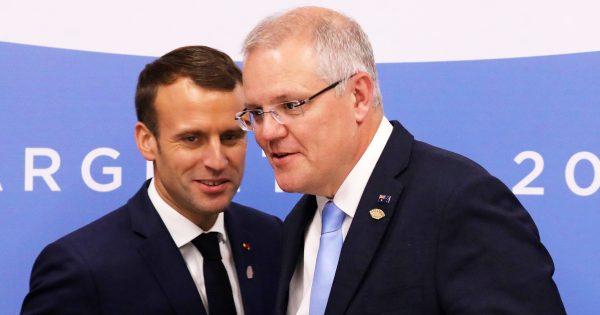 French President Emmanuel Macron (L) greets Australian Prime Minister Scott Morrison during the G20 Leaders' Summit in Buenos Aires on Nov. 30, 2018. (Ludovic Marin/AFP/Getty Images)