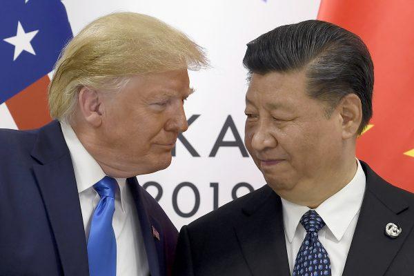 Then-President Donald Trump, left, meets with Chinese leader Xi Jinping during a meeting on the sidelines of the G-20 summit in Osaka, Japan, on June 29, 2019. (Susan Walsh/AP Photo)