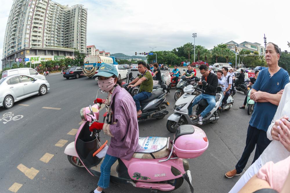 A booming economy with a huge population makes Chinese traffic especially intense (Illustration - Shutterstock | <a href="https://www.shutterstock.com/image-photo/china-hainan-island-dadonghai-bay-november-1354933238?src=26tfAsFnrPBHH_wx7Vhnkg-2-8&studio=1">evgenii mitroshin</a>)
