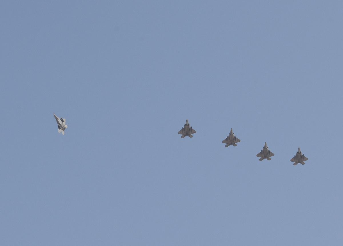U.S. Air Force F-22 Raptors fly in formation as they prepare to land at Al Udeid Air Base, Qatar, June 27, 2019. (U.S. Air Force/Staff Sgt. Ashley Gardner)