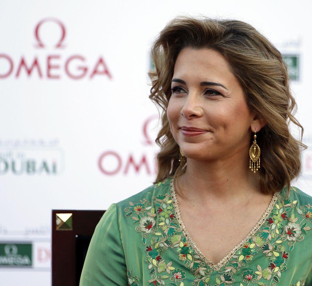 Princess Haya Bint Al-Hussein, the wife of Sheikh Mohammed Bin Rashid Al-Maktoum, Vice-President and Prime Minister of the UAE and Ruler of Dubai, looks on after presenting Shanshan Feng of China with a trophy for winning the Dubai Ladies Masters golf tournament in the Gulf emirate on Dec. 12, 2015. (Karim Sahib/AFP/Getty Images)