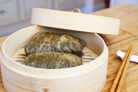Steaming the wrapped parcels infuses them with the lotus leaves' fragrance. (CiCi Li)