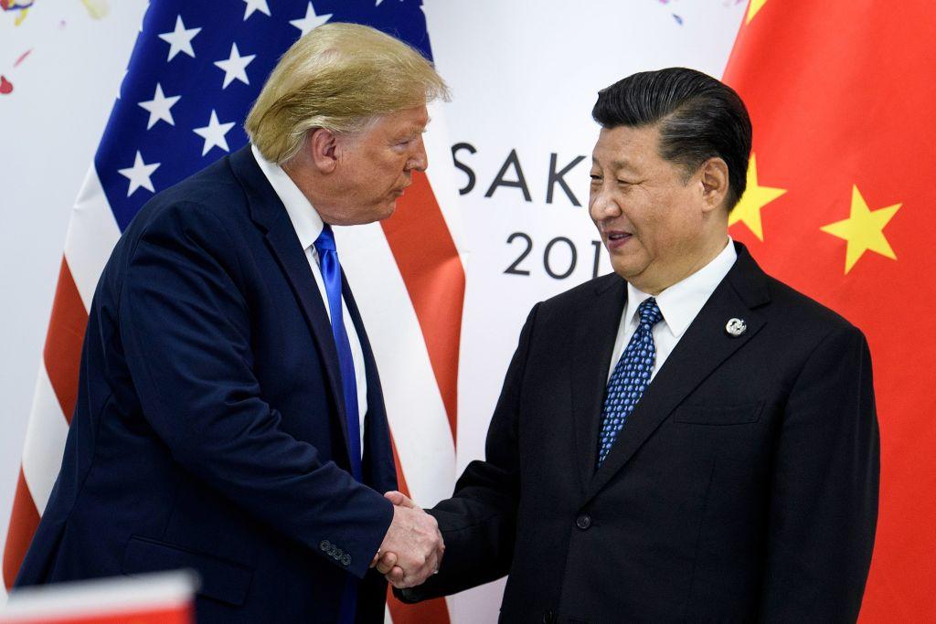 Chinese leader Xi Jinping shakes hands with U.S. President Donald Trump before a bilateral meeting on the sidelines of the G20 Summit in Osaka on June 29, 2019. (Brendan Smialowski/AFP/Getty Images)