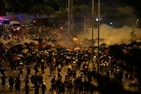 Police fire tear gas at protesters near the government headquarters in Hong Kong on July 2, 2019. (Anthony Wallace/AFP/Getty Images)