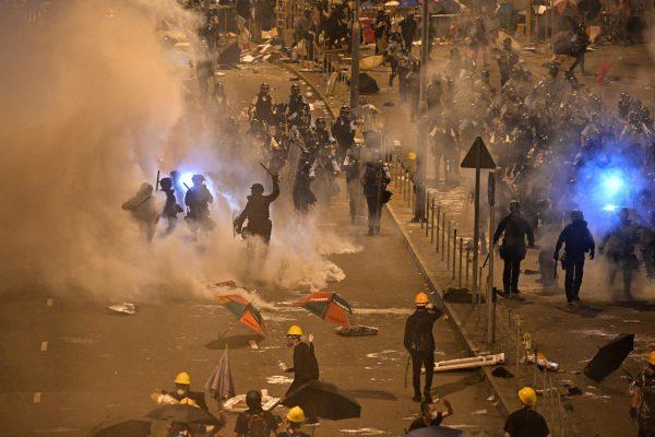 Police fire tear gas at protesters near the government headquarters in Hong Kong on July 2, 2019. (Anthony Wallace/AFP/Getty Images)