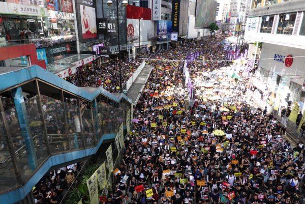 Protesters at Hennessy Road in Causeway Bay on July 1, 2019. (Yu Gang/The Epoch Times)