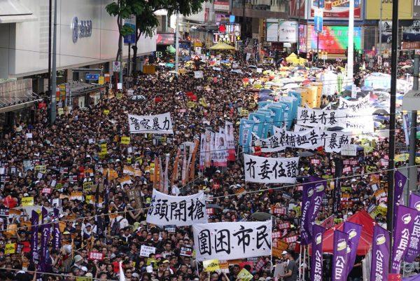 Protesters fill the streets in Hong Kong on July 1, 2019, in a protest against a controversial extradition bill. (Yu Gang/The Epoch Times)