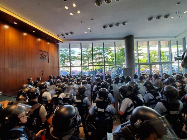 Police officers on guard inside the Legislative Council on July 1, 2019. (Sun Qingtian/The Epoch Times)