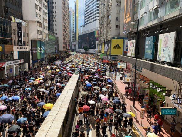 Protesters march in Hong Kong on July 1, 2019. (Luo Ya/The Epoch Times)