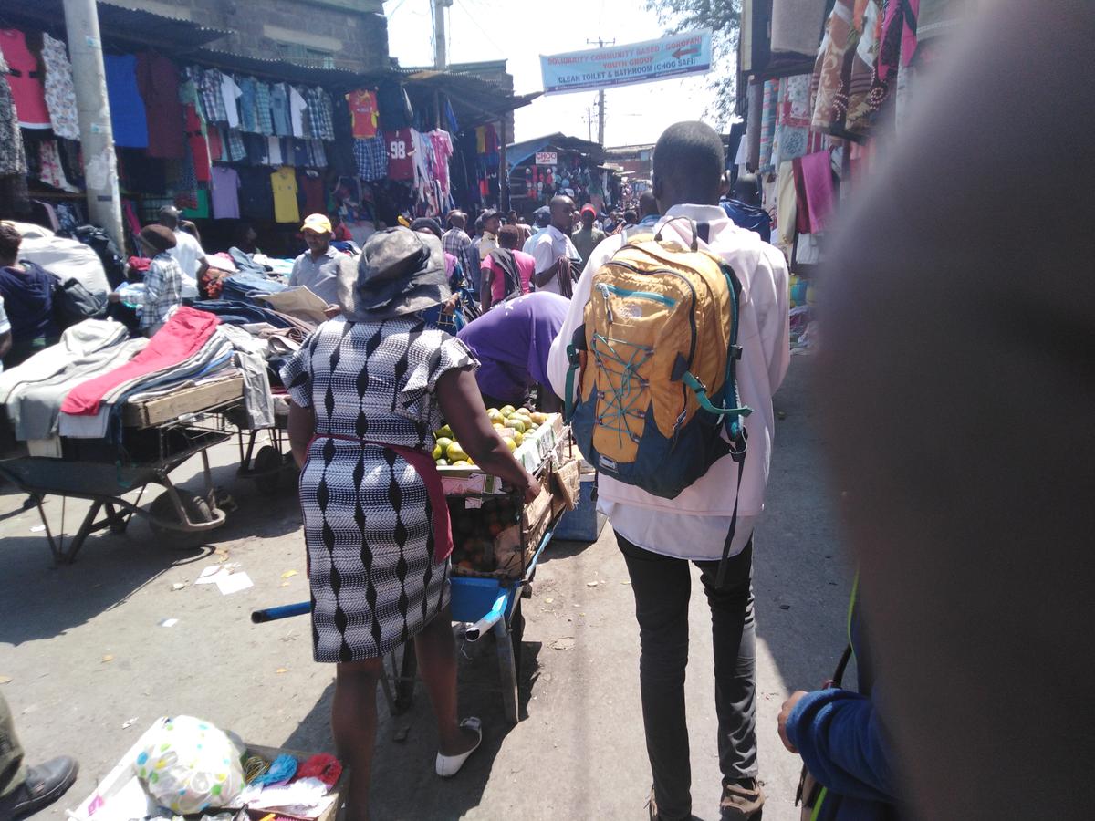 Store Vendor in Gikomba market in Nairobi, Kenya, on July 19, 2019. Many vendors carry their goods on wheelbarrows as they cannot afford the stall rent. (Dominic Kirui/The Epoch Times)