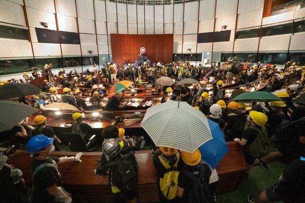 Protesters break into the Legislative Council Complex protest against the extradition bill on July 1, 2019 in Hong Kong, China. (Li Yi/The Epoch Times)