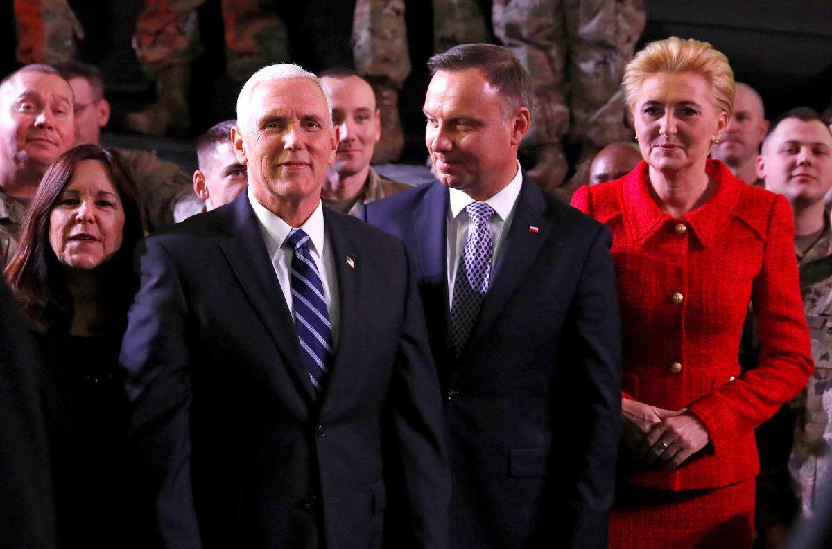 U.S. Vice President Mike Pence, his wife Karen, Polish President Andrzej Duda and his wife Agata Kornhauser-Duda are seen after Pence's arrival at the airport in Warsaw, Poland, on Feb. 13, 2019. (Kacper Pempel/Reuters)