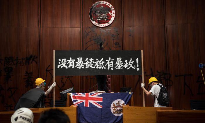 Beijing Lashes Out at Hong Kong Protesters